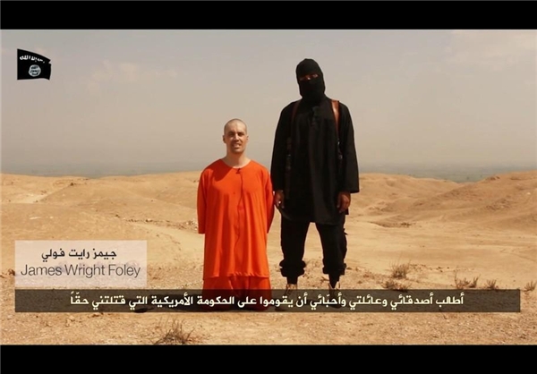 داعش خبرنگار آمریکایی را سر برید+ عکس